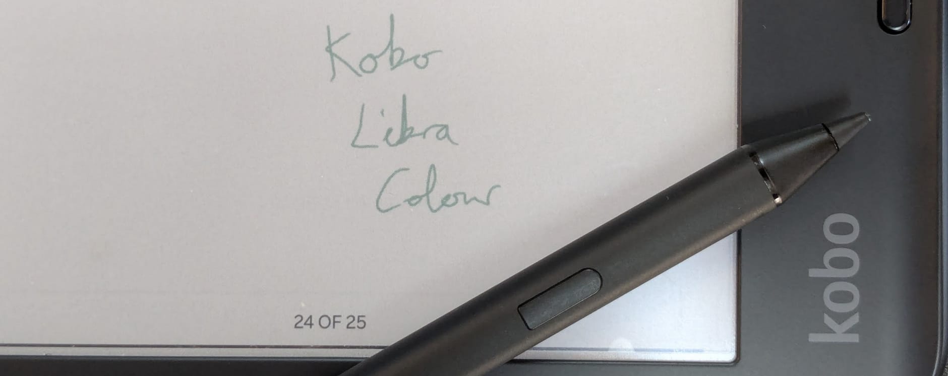 Photograph of my Kobo Stylus 2 resting on my Kobo Libra Colour. A writing sample says "Kobo Libra Colour" in green.